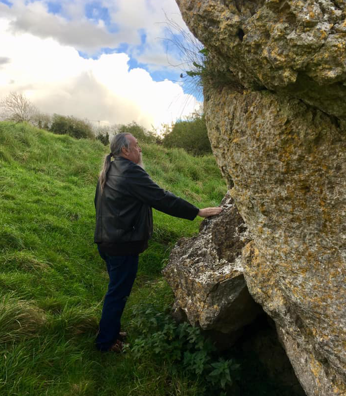 Bob touching Ail na M�reann at Uisneach